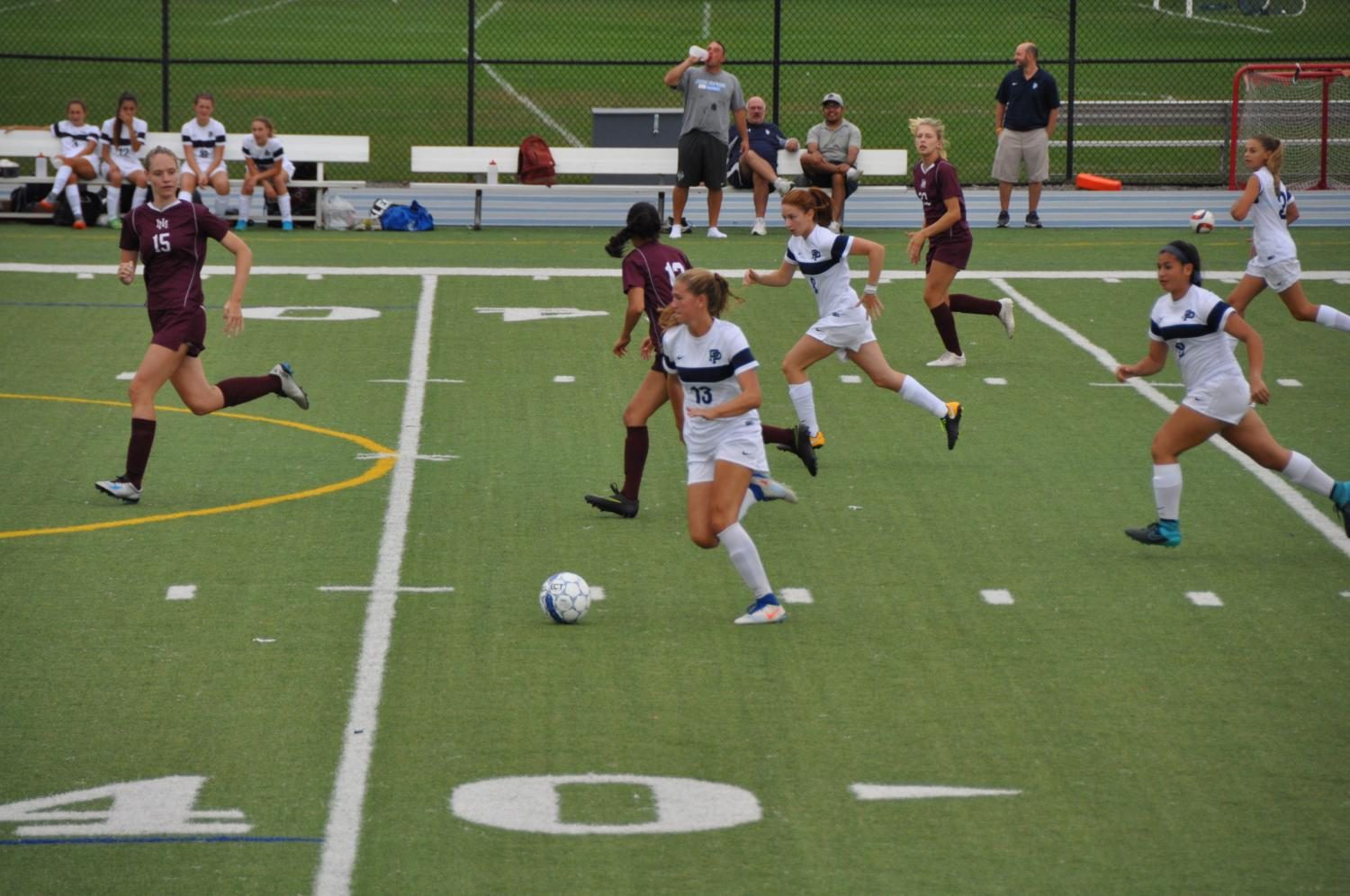 Senior Maeve Reagan on offense against Horace Mann.