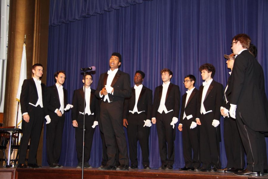 The Whiffenpoofs serenade Polys upper school students during assembly.