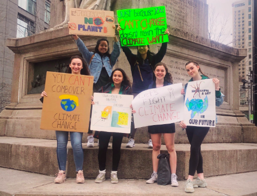 Juniors Olivia Hurley and Madison Malerba pose with Seniors Leigh Hilty, Lian Jones, Olivia Keany, and Erika Williams at the protest.