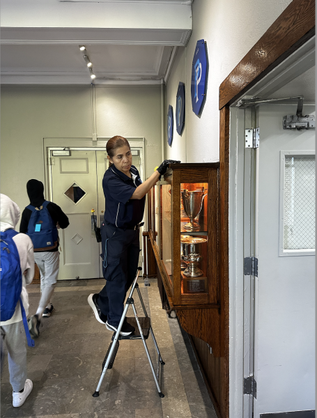 A Hero Behind the Scenes: Rosa Garcia Sweeping Glances as an Integral Member of the Housekeeping Staff at Poly